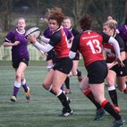 Group of women's rugby players in a game. Image links to Rugby Women's page on Bristol SU website.	